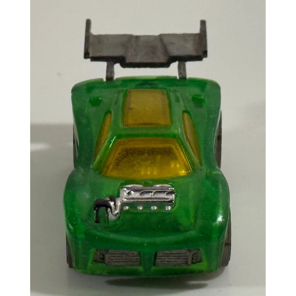 Hot Wheels Paradigm Shift Kids 1:64 Green Translucent Diecast Race Car Spoiler